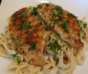 Grilled Chicken Over Creamy Fettuccine Alfredo