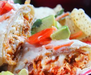 Smothered Buffalo Chicken Baked Burritos