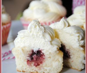 Almond Wedding Cake Cupcakes with Raspberry Filling