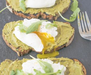 Avocado artichoke toast with poached egg