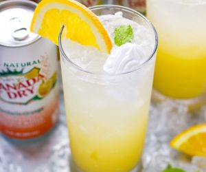 ORANGE CREAMSICLE COCKTAIL WITH WHIPPED COCONUT CREAM