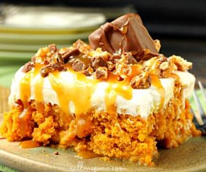 Skinny Pumpkin Snickers Poke Cake with Whipped Cream Frosting