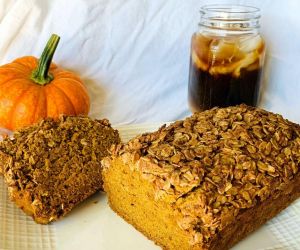 Pumpkin bread topped with a peanut butter crumble